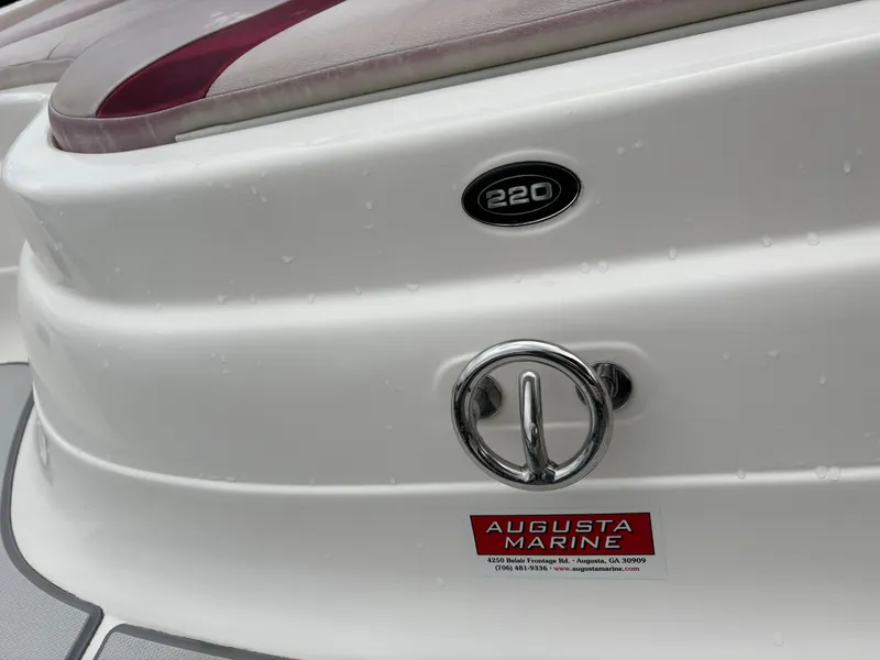 Slide: The Image of Bryant 220 boat, 2012 model, with Augusta Marine branding and chrome details. - 8