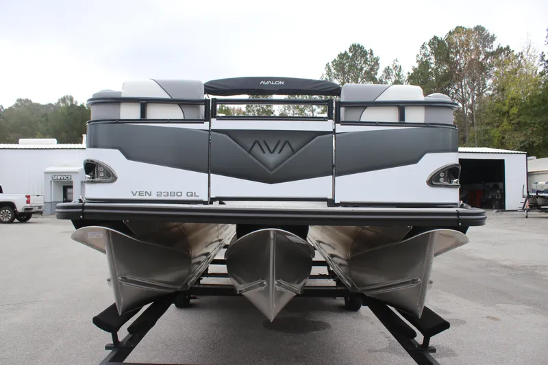 Slide: The Image of 2025 Avalon VENTURE QUAD LOUNGER pontoon boat on trailer, rear view. - 3