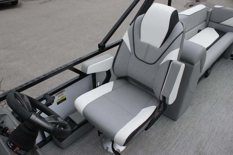 Slide: The Image of 2025 Avalon VENTURE QUAD LOUNGER interior with modern seating and steering wheel. - 6