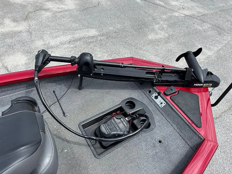 Slide: The Image of 2024 Tracker Pro Team 190 TX boat with Minn Kota trolling motor on deck. - 13