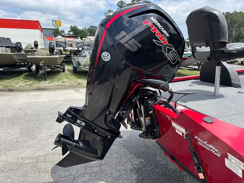 Slide: The Image of 2024 Tracker Pro Team 190 TX boat with Mercury Pro XS engine, parked outdoors. - 9