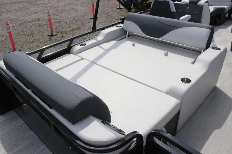 Slide: The Image of 2025 Avalon LSZ Versatile Rear Lounger with spacious seating and cup holders. - 2