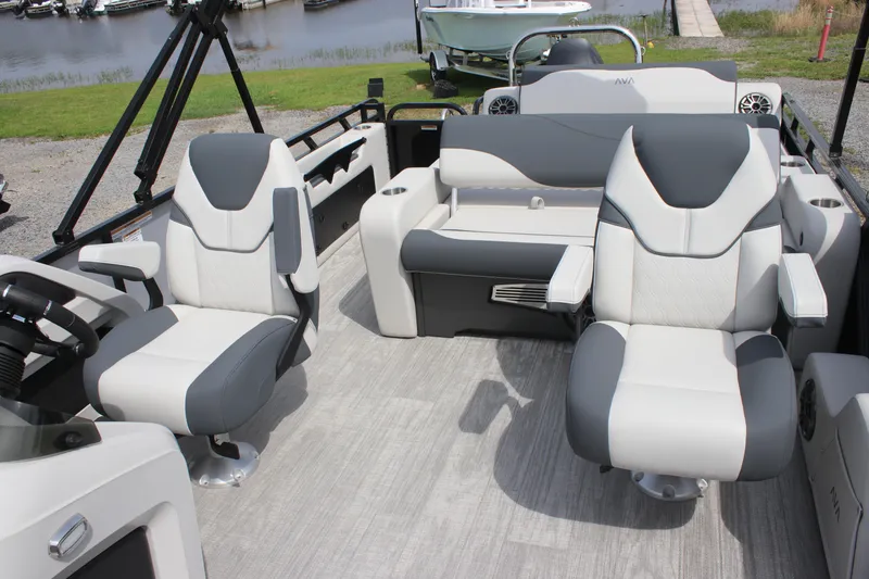 Slide: The Image of 2025 Avalon LSZ Versatile Rear Lounger boat interior with modern seating and sleek design. - 7