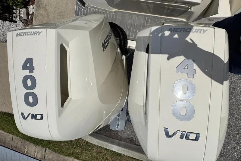 Slide: The Image of Twin Mercury 400 V10 outboard engines on a 2025 Scout 305 LXF boat. - 27