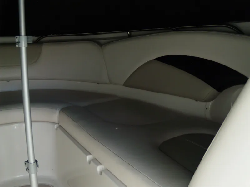 Slide: The Image of Interior seating of 2008 Chaparral SSX 276 boat, featuring cushioned upholstery. - 22
