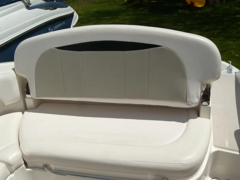 Slide: The Image of 2008 Chaparral SSX 276 boat seat, white upholstery, outdoor setting. - 7