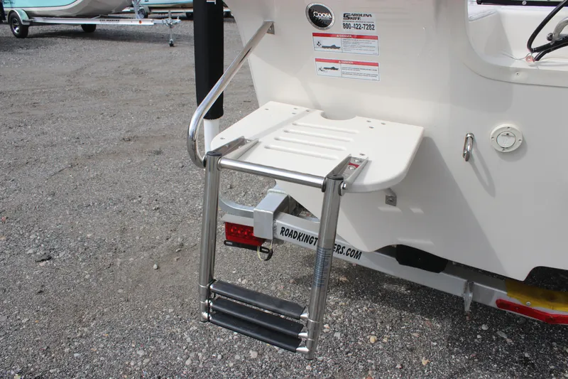 Slide: The Image of 2024 Carolina Skiff 21 LS boat with rear swim platform and ladder. - 13
