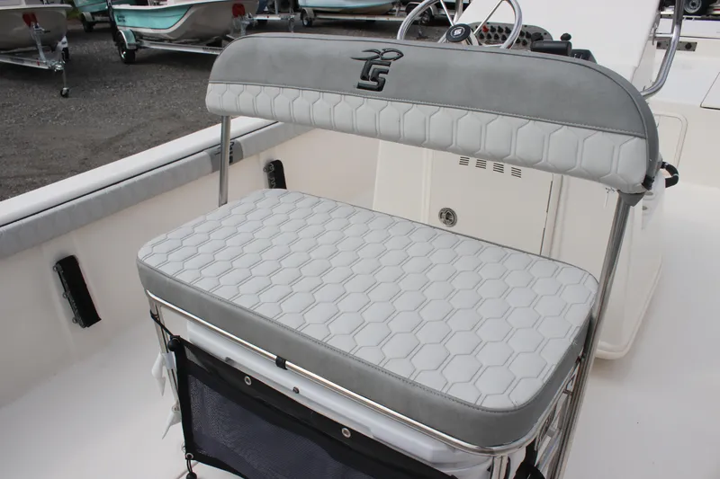 Slide: The Image of 2024 Carolina Skiff 21 LS boat seat with hexagonal pattern and logo. - 19