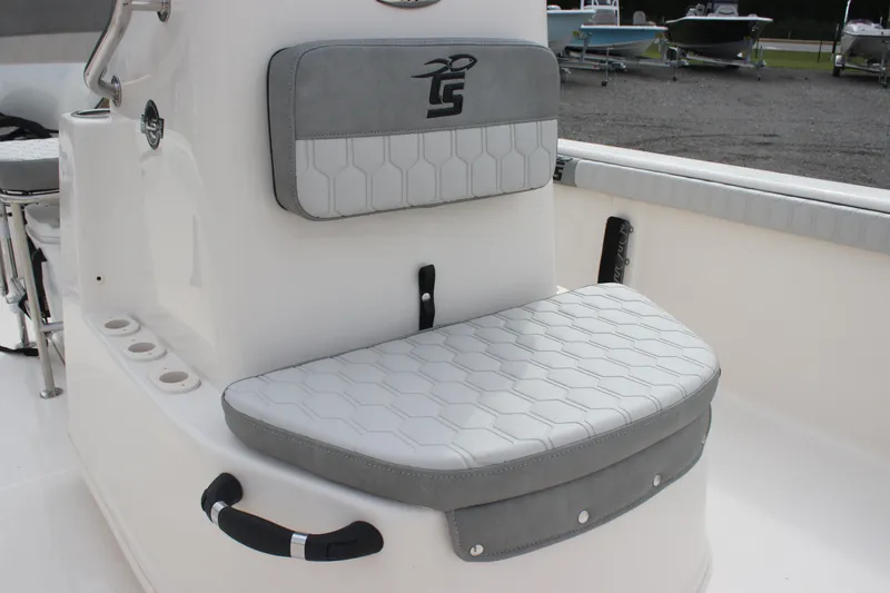 Slide: The Image of 2024 Carolina Skiff 21 LS boat seat with gray and white upholstery. - 20