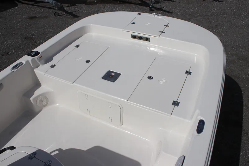 Slide: The Image of 2024 Carolina Skiff 21 LS boat deck with storage compartments. - 4