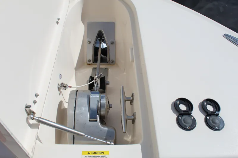 Slide: The Image of 2018 Grady-White Canyon 306 boat anchor system with cleats and winch. - 14