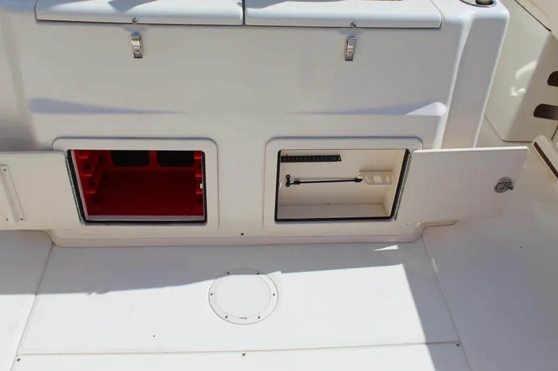 Slide: The Image of 2018 Grady-White Canyon 306 boat storage compartments, open and ready for use. - 20