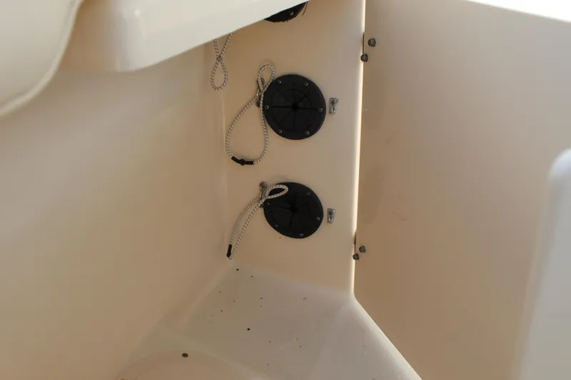 Slide: The Image of Interior view of 2018 Grady-White Canyon 306 boat, showing storage compartment details. - 29