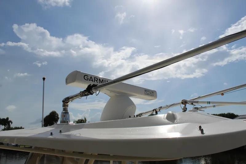 Slide: The Image of 2018 Grady-White Canyon 306 boat with Garmin radar under a sunny sky. - 7