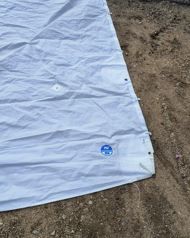 Slide: The Image of White sail on sandy ground, Hunter 216 model, 2008. - 12