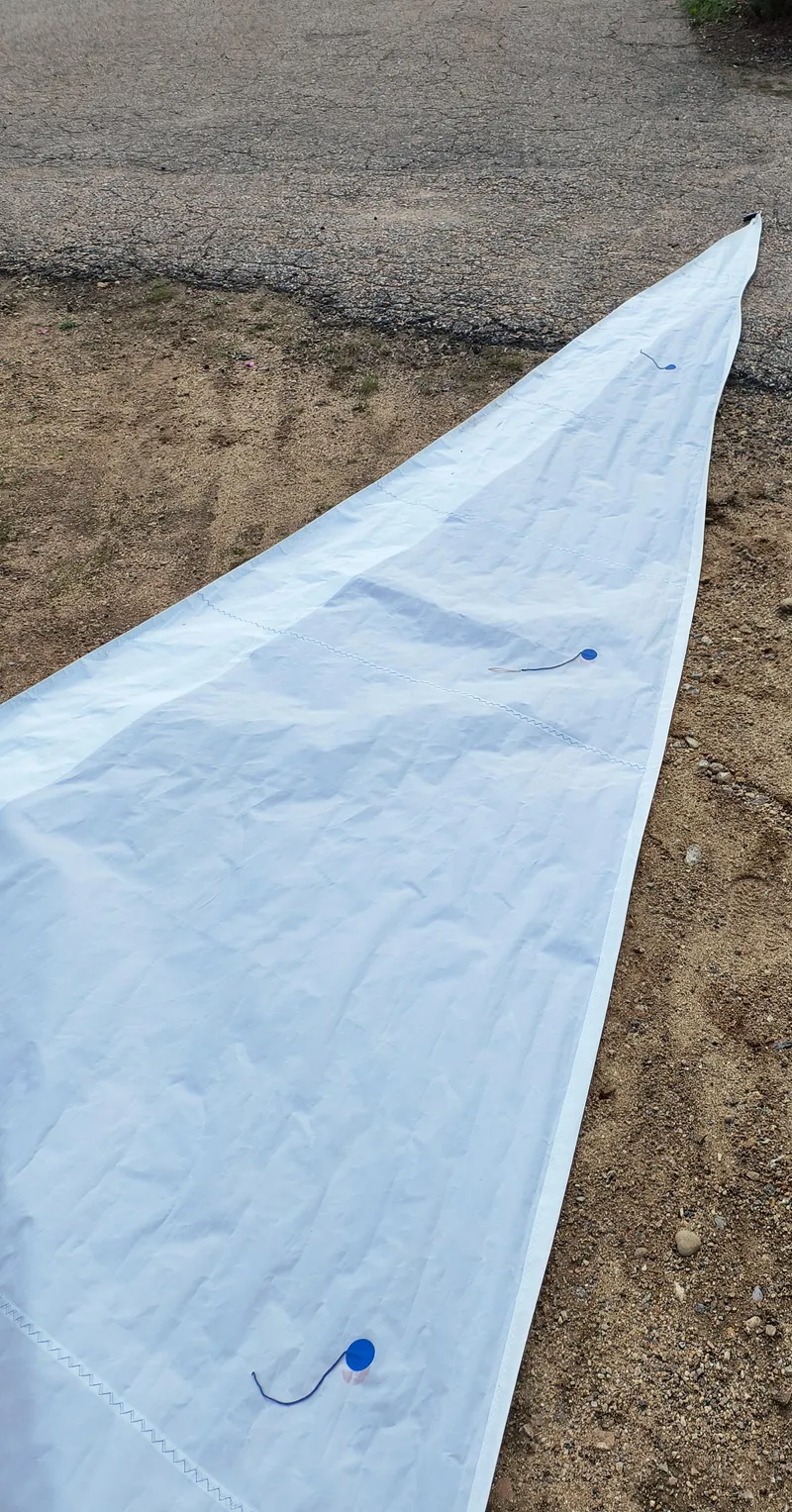 Slide: The Image of White sail laid out on ground, Hunter 216 model, 2008. - 14