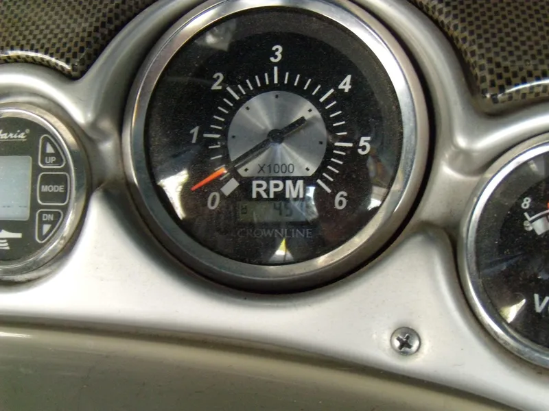 Slide: The Image of Close-up of 2006 Crownline 260 LS boat RPM gauge showing 1,000 RPM. - 13