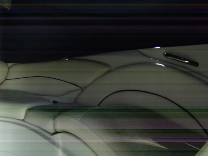 Slide: The Image of 2006 Crownline 260 LS boat interior with sleek, modern design and comfortable seating. - 15