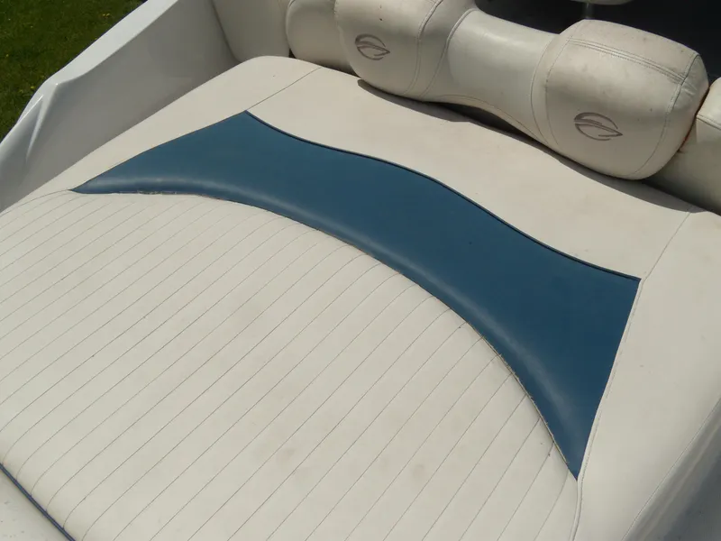 Slide: The Image of Crownline 260 LS 2006 boat seat with blue and white upholstery. - 7