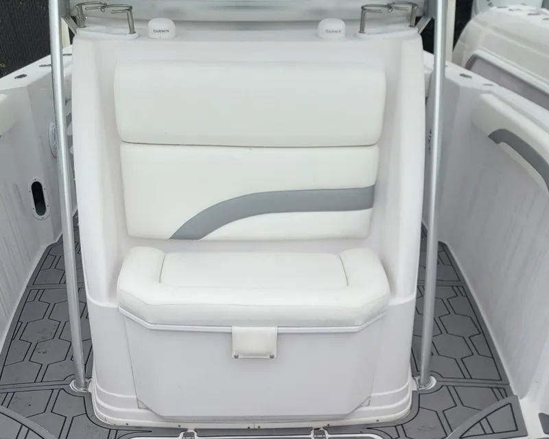 Slide: The Image of 2006 Donzi 32 ZF boat seat with white and gray upholstery. - 10