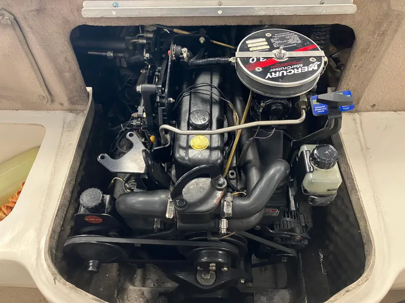 Slide: The Image of Engine of a 2001 Sea Ray 180 Bow Rider boat, featuring a Mercury 3.0L motor. - 4