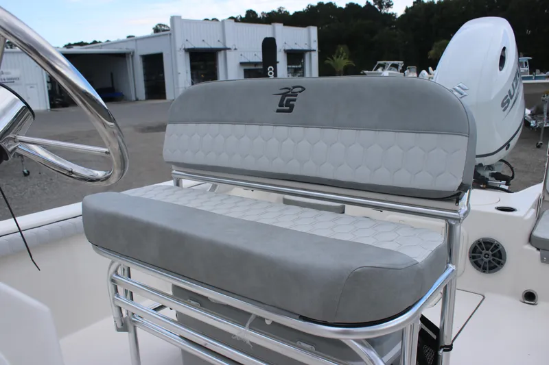 Slide: The Image of 2025 Carolina Skiff 21 LS boat seat with gray upholstery and sleek design. - 10