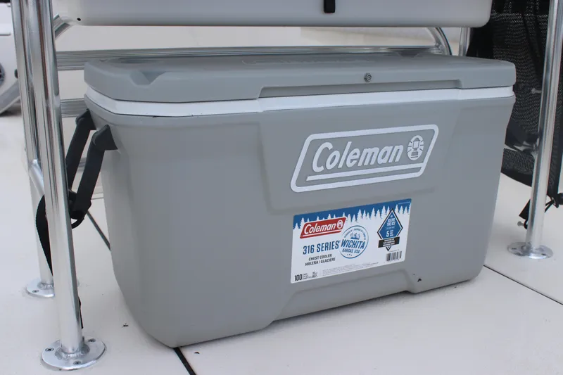 Slide: The Image of Coleman cooler on 2025 Carolina Skiff 21 LS boat deck. - 15
