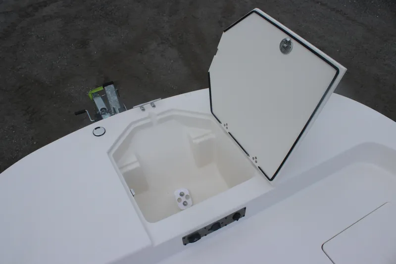 Slide: The Image of Open storage compartment on 2025 Carolina Skiff 21 LS boat. - 6