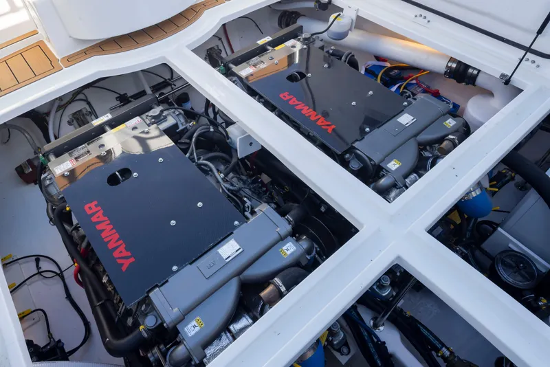 Slide: The Image of Engine compartment of 2025 Ocean Sport Roamer with dual Yanmar engines. - 32