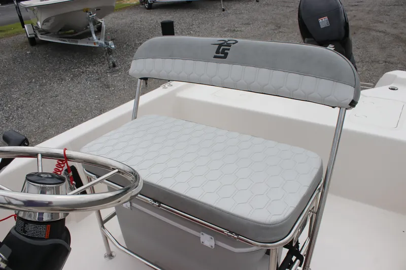 Slide: The Image of 2025 Carolina Skiff E18 JVX CC boat seat and steering wheel detail. - 9