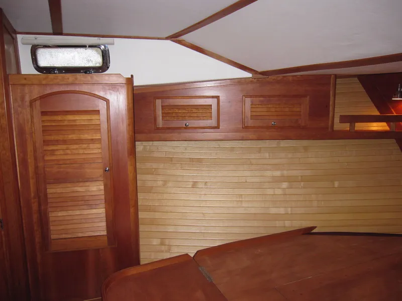 Slide: The Image of Interior of 2005 Sabre 38 sailboat with wooden cabinetry and paneling. - 10