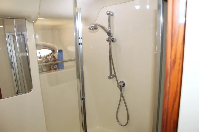 Slide: The Image of Shower area in 2000 Sea Ray 480 Sedan Bridge yacht, featuring modern fixtures. - 39
