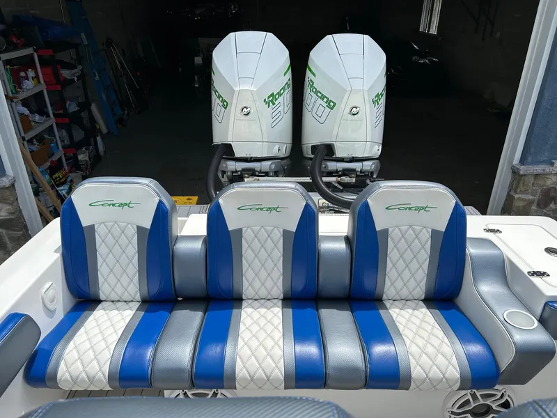 Slide: The Image of 2021 Concept 30 Open boat seats with blue and white design, dual outboard engines. - 4