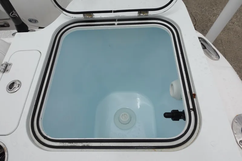 Slide: The Image of Open livewell on 2024 Sea Fox 268 Commander boat, showcasing interior design. - 10