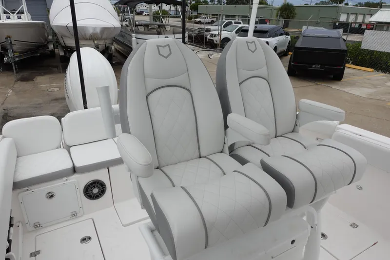 Slide: The Image of 2024 Sea Fox 268 Commander boat with luxurious dual captain's chairs. - 12