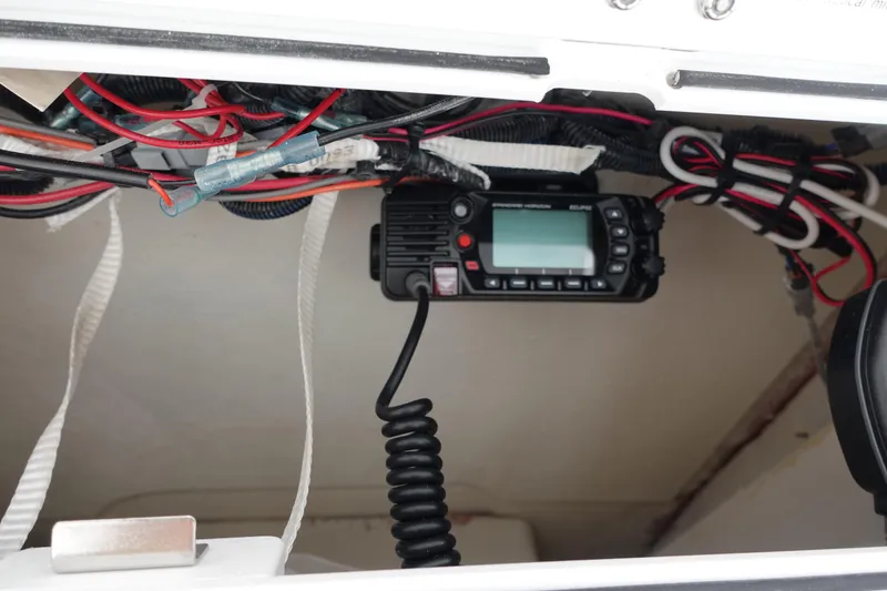 Slide: The Image of 2024 Sea Fox 268 Commander boat interior with radio and wiring. - 17