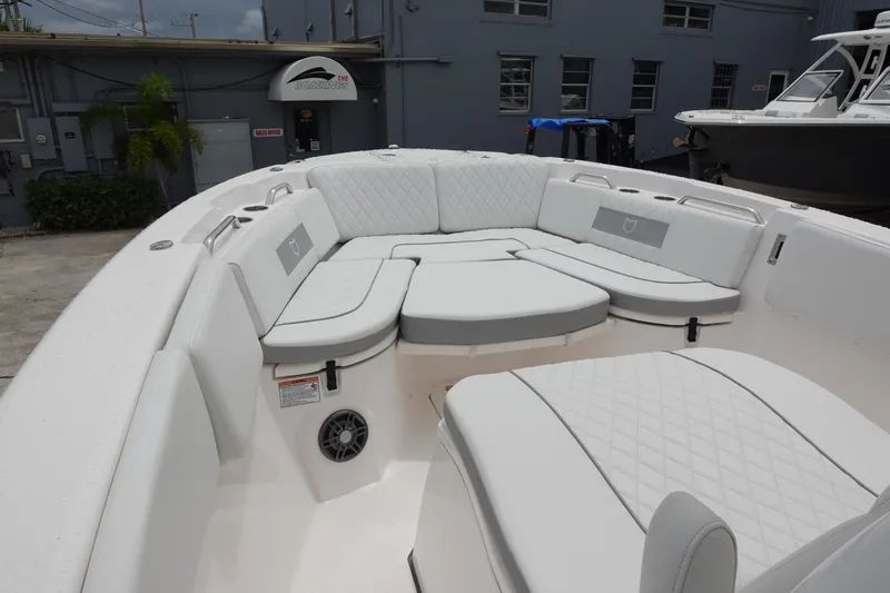 Slide: The Image of 2024 Sea Fox 268 Commander boat with spacious white seating and modern design. - 20