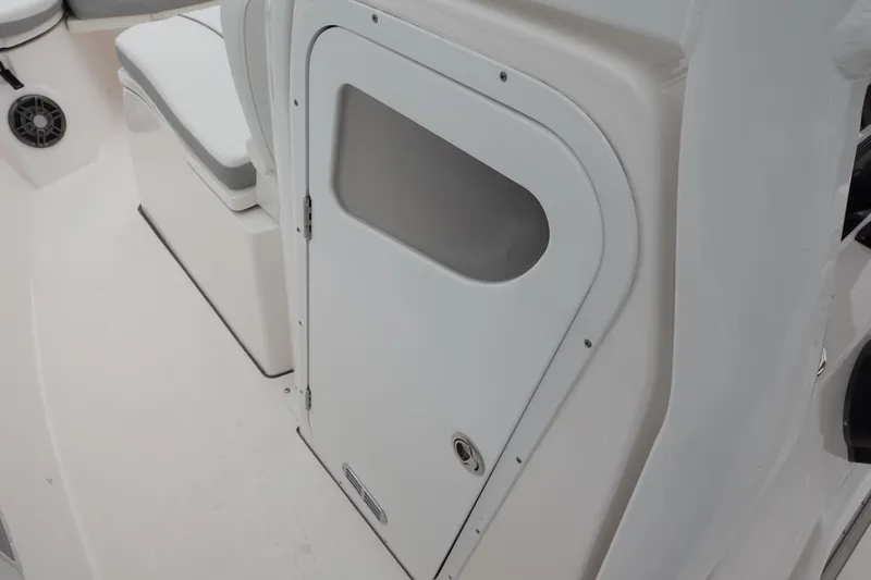 Slide: The Image of 2024 Sea Fox 268 Commander boat interior with storage compartment and seating. - 27