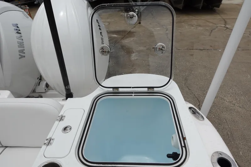 Slide: The Image of 2024 Sea Fox 268 Commander boat with open hatch and Yamaha engines. - 9