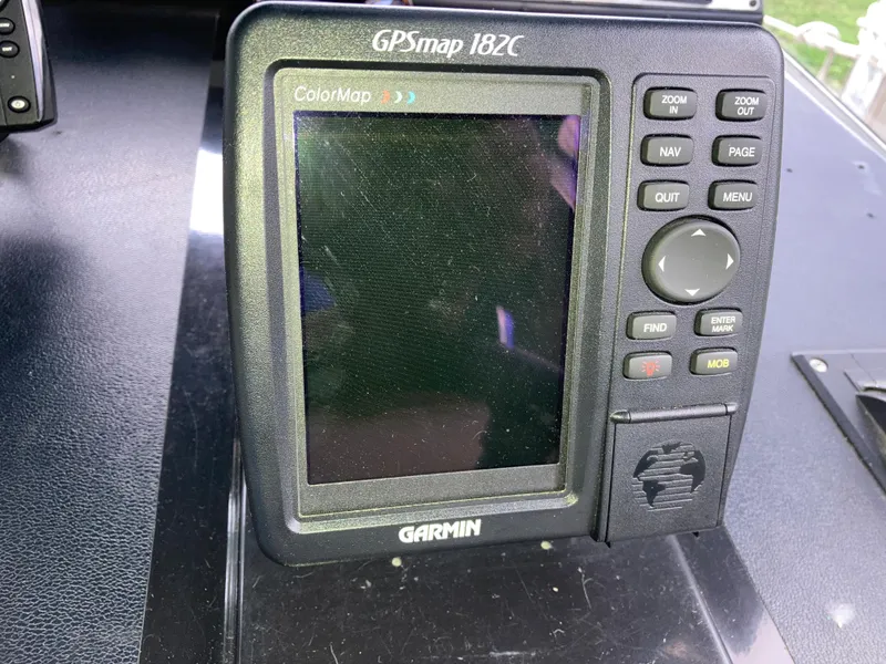 Slide: The Image of Garmin GPSmap 182C on 1988 Carver 3257 MONTEGO boat dashboard. - 16