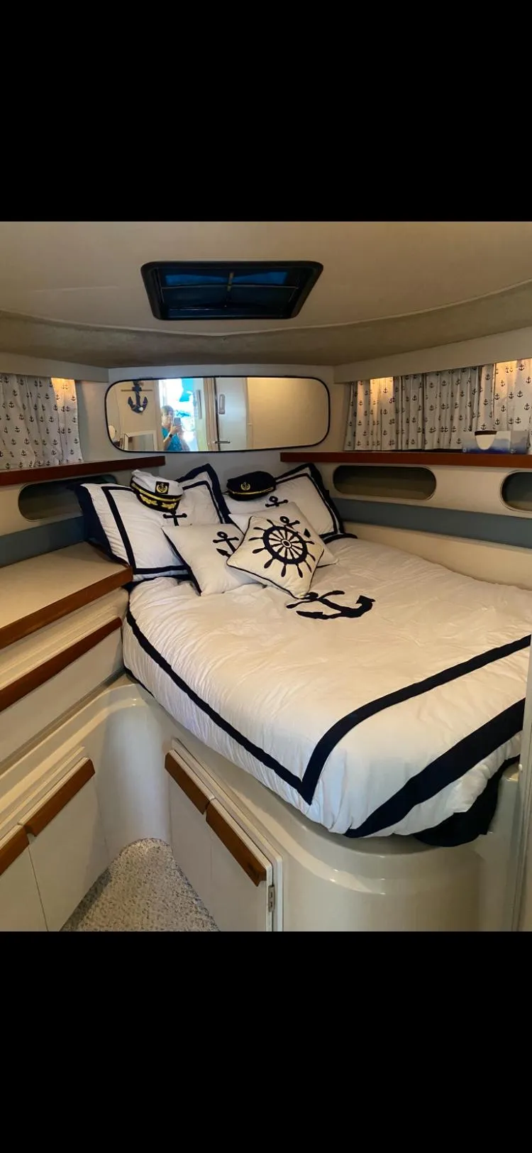 Slide: The Image of Interior of 1988 Carver 3257 MONTEGO yacht with nautical-themed bedding. - 4