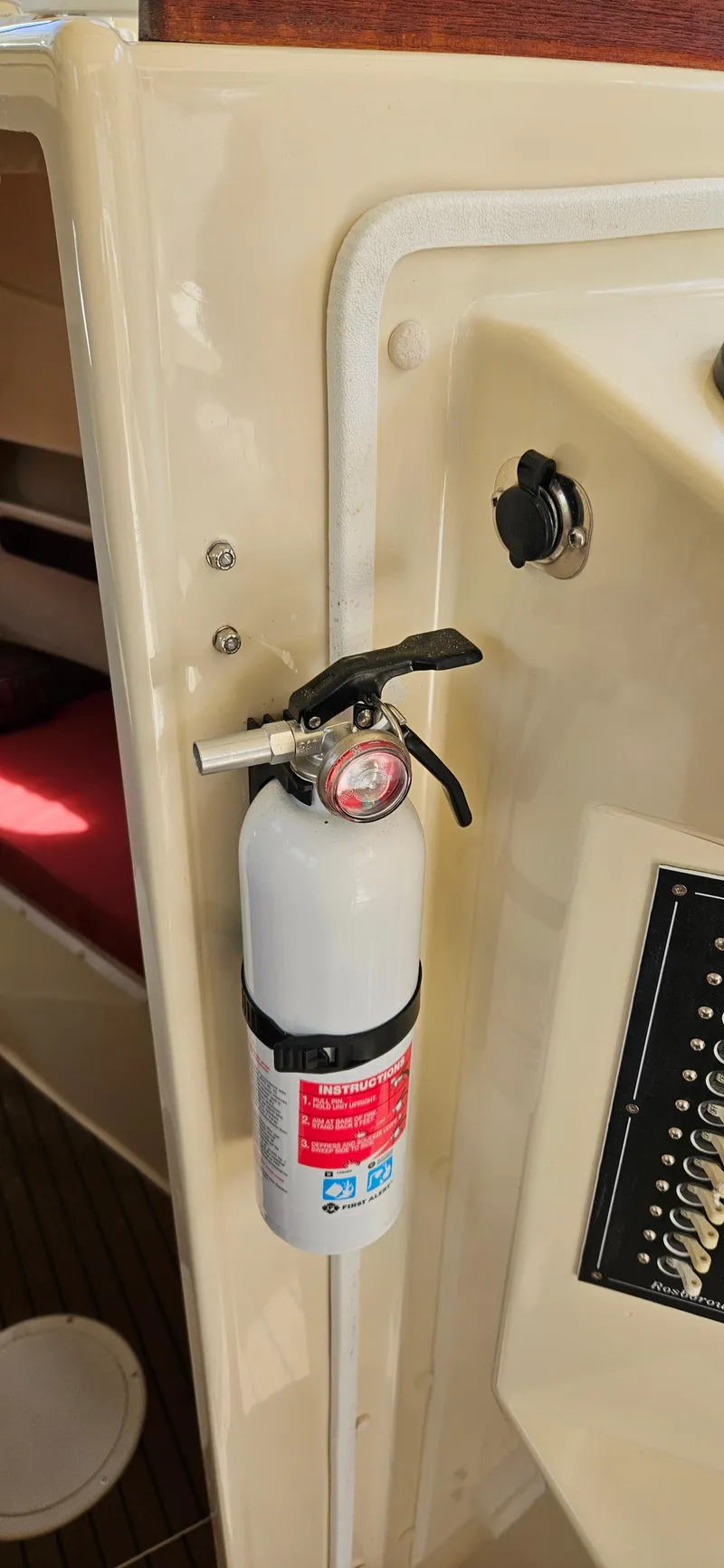 Slide: The Image of Fire extinguisher mounted on 2001 Rosborough RF-246 Custom Wheelhouse interior panel. - 16