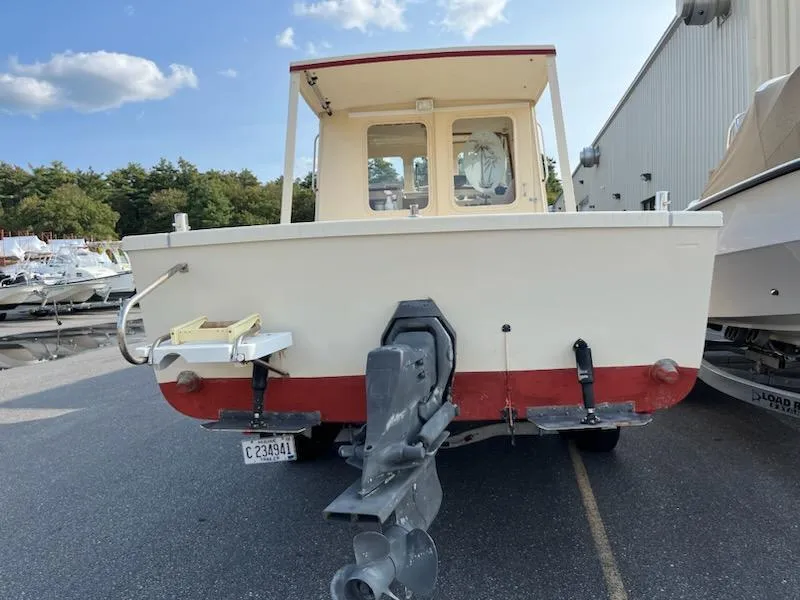 Slide: The Image of 2001 Rosborough RF-246 Custom Wheelhouse boat, rear view, parked outdoors. - 2