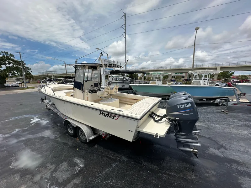 Slide: The Image of 2011 Parker 2500 Special Edition boat with Yamaha outboard motor on a trailer. - 1