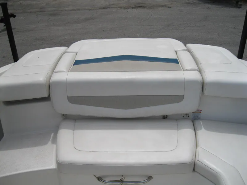 Slide: The Image of 2012 Chaparral 206 SSi boat seating with white and blue upholstery. - 10