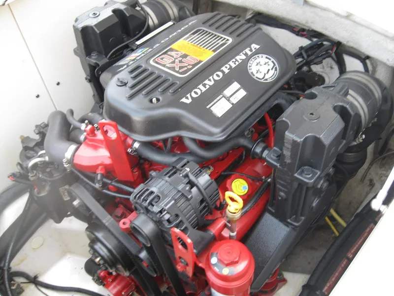 Slide: The Image of Volvo Penta engine in a 2012 Chaparral 206 SSi boat, showcasing detailed components. - 27