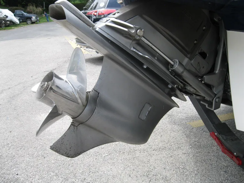 Slide: The Image of Propeller and outdrive of a 2012 Chaparral 206 SSi boat on pavement. - 30