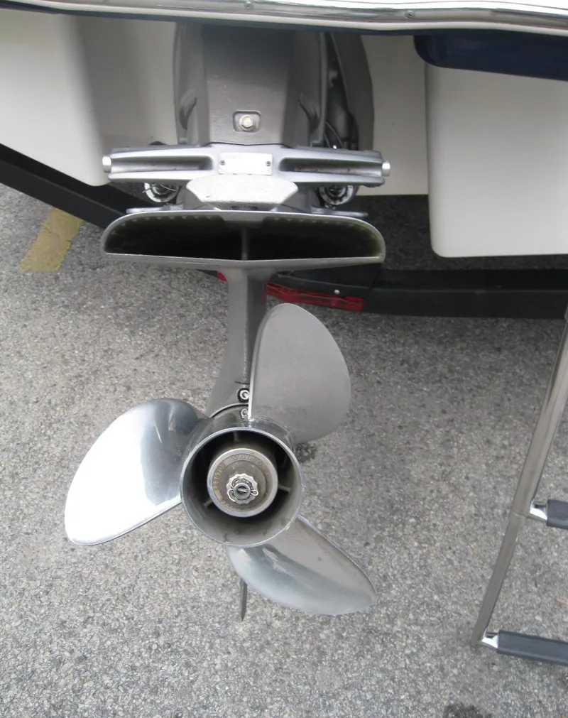 Slide: The Image of 2012 Chaparral 206 SSi boat propeller and ladder on concrete surface. - 31