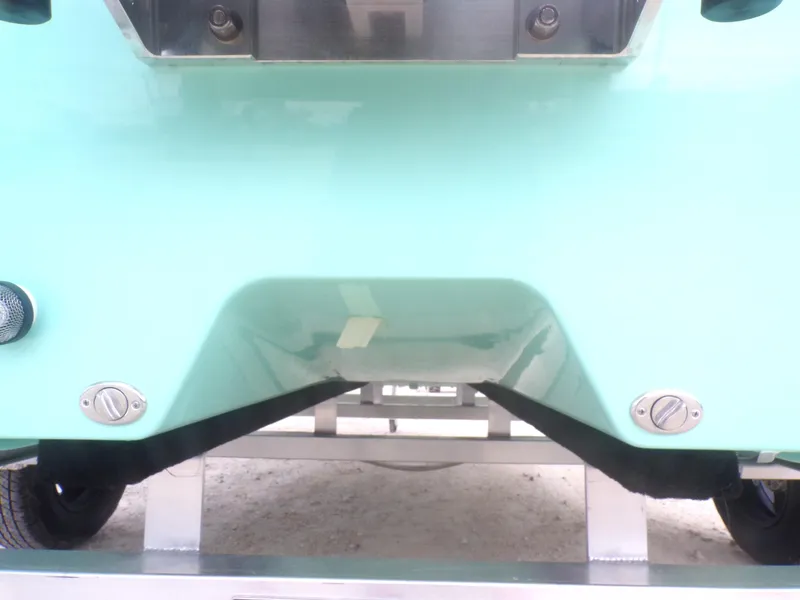 Slide: The Image of Close-up of Freedom Eagle 16 boat hull, 2025 model, featuring sleek design and metallic fixtures. - 11