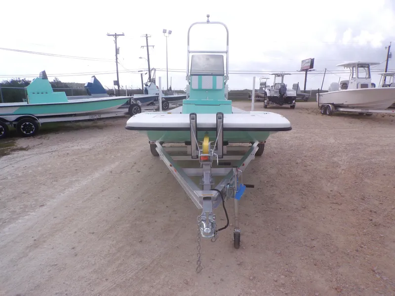 Slide: The Image of 2025 Freedom Eagle 16 boat on trailer in outdoor lot. - 5